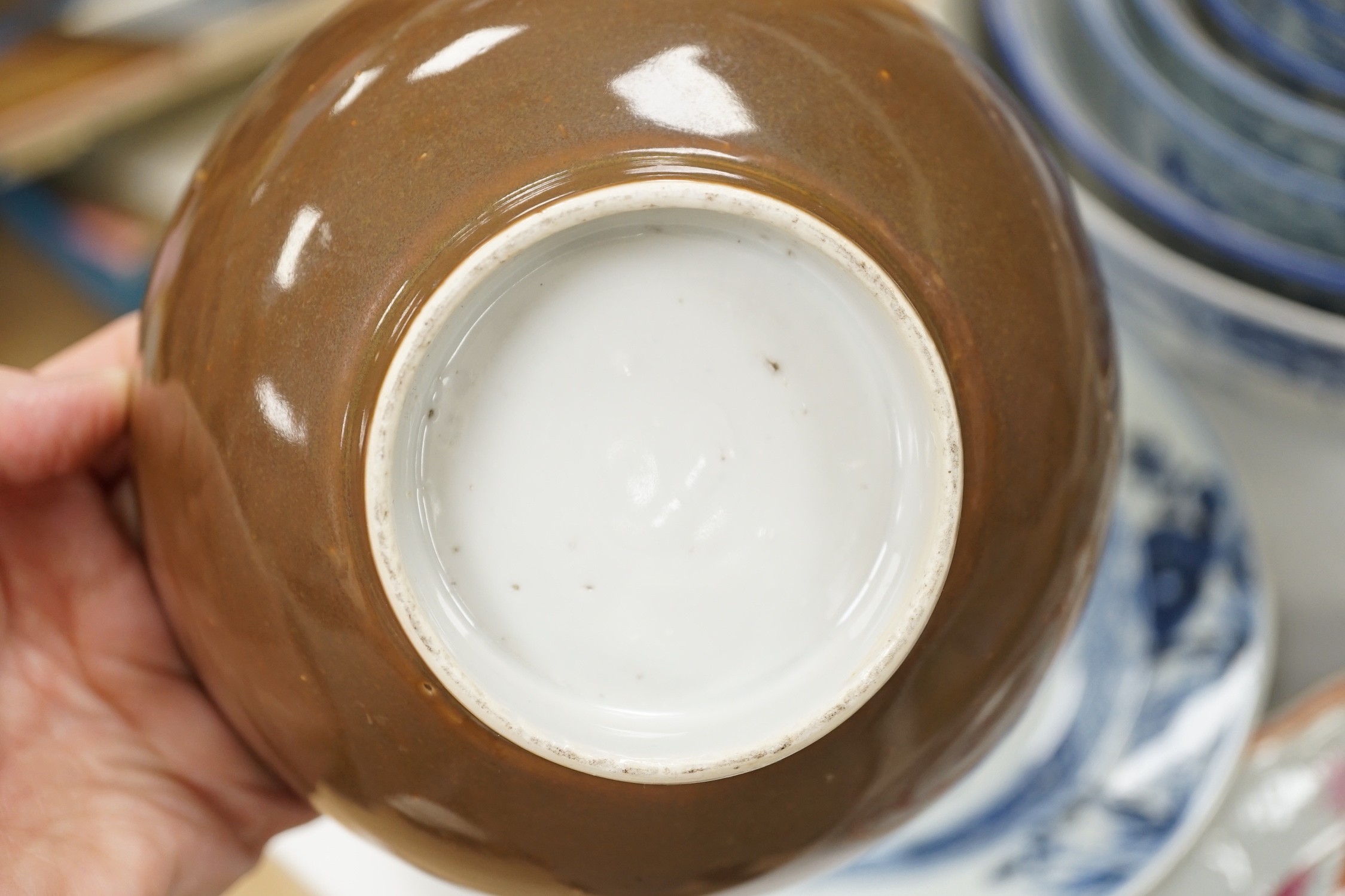 An assortment of Chinese porcelain tin-glazed earthenware charger and a Delft vase